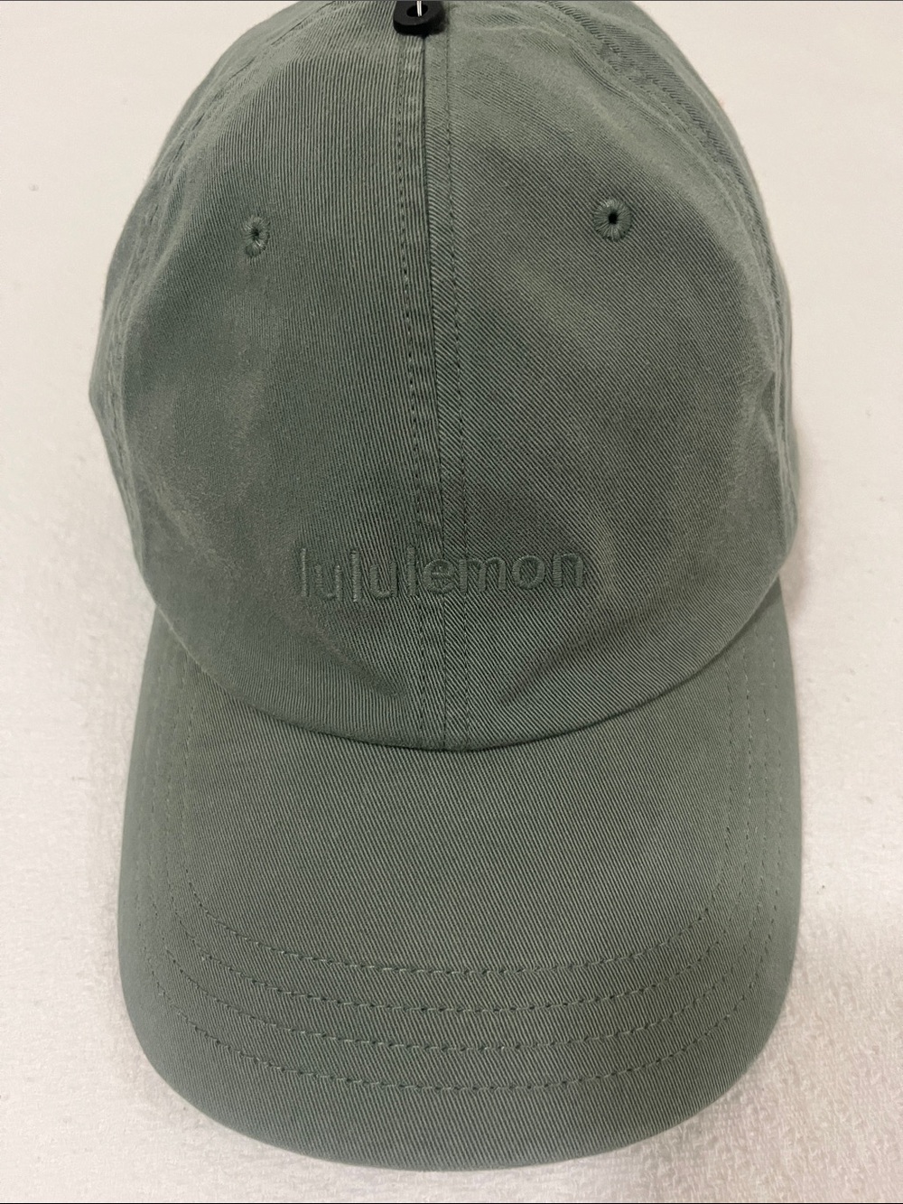 lululemon olive green hat with interior logo tag